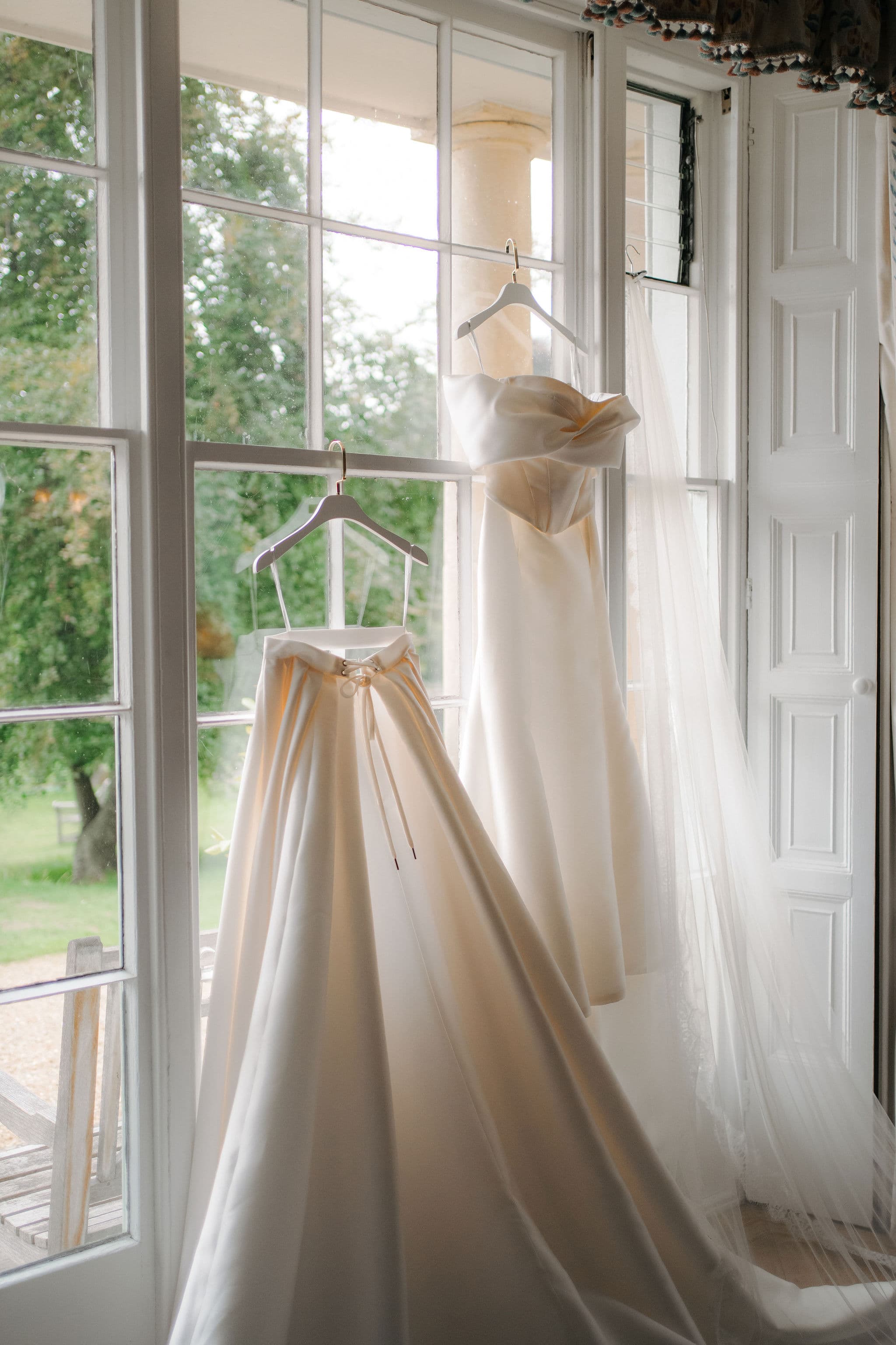 Bridal dress photographed by the window